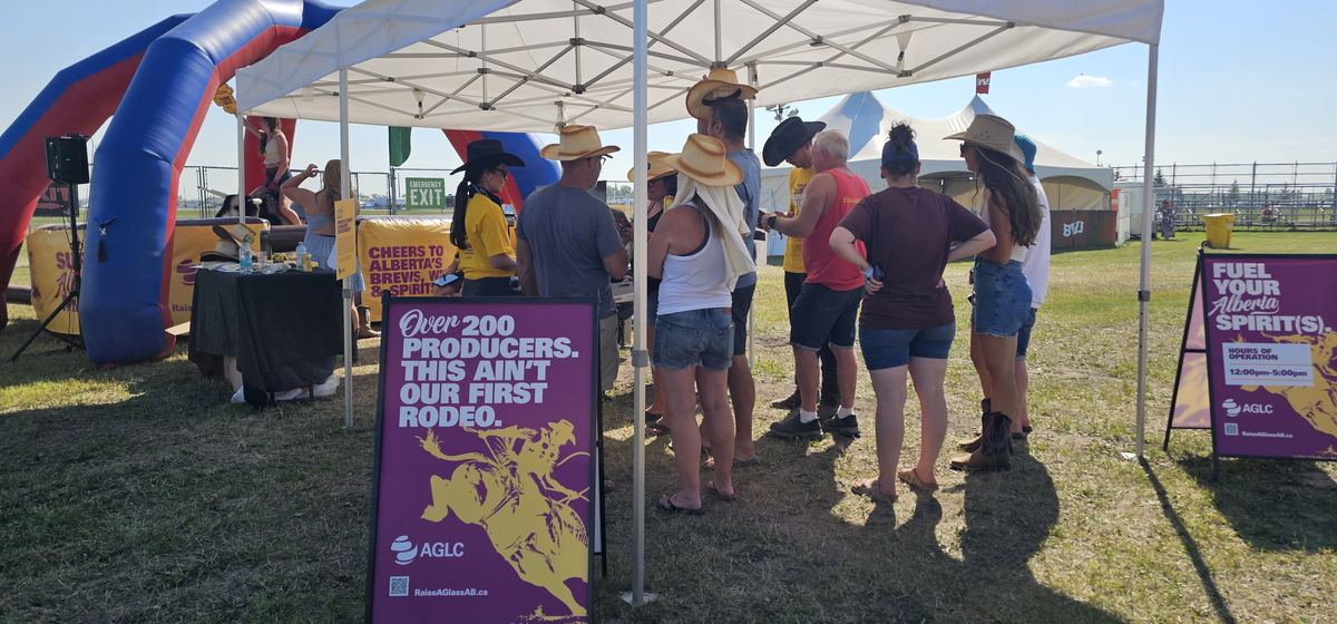 AGLC Raise a Glass — bull ride crowd